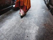Woman walking on street