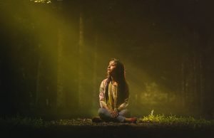 Girl sitting on grass